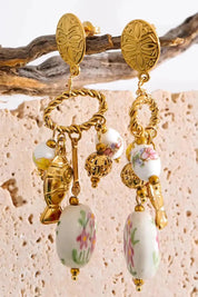 Product shot of the St Tropez Floral Charm Earring - Multi in colour Multi, from the front