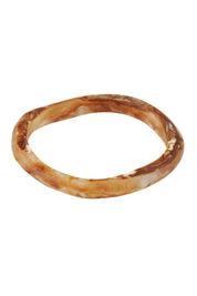 Product shot of the Wave Resin Stacking Bangle in colour Horn, from the front