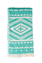 Product shot of the Hammamas Aztec Cotton Towel in colour Emerald (Green), from the front