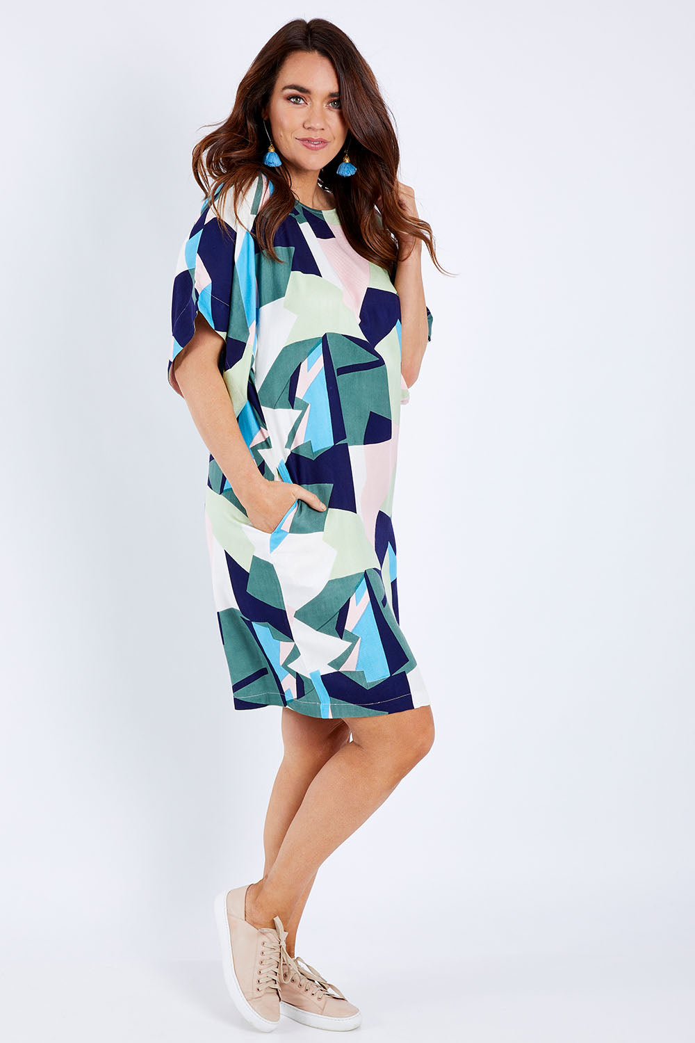 Model Laura wearing size 14 of the Bell Sleeve Tunic Dress in colour Geo (Blue), from the front, showing the whole outfit