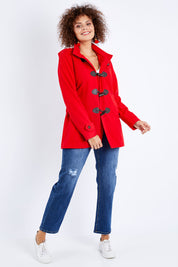 Model Jess wearing size 10 of the Duffle Jacket in colour Red (Red), from the front, showing the whole outfit