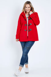Model Jess wearing size 14 of the Duffle Jacket in colour Red (Red), from the front, showing the whole outfit