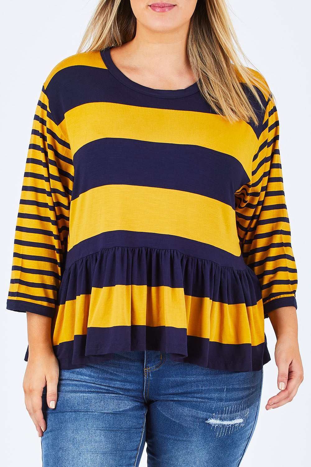 Model Jess wearing size 14 of the Hem Frill Stripe Top in colour SoFrilled (Blue), from the front, cropped image