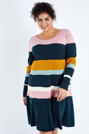 Model Sasha-Lee wearing size XL of the Knit Stripe Dress in colour Mixstripe (Green), from the front, cropped image