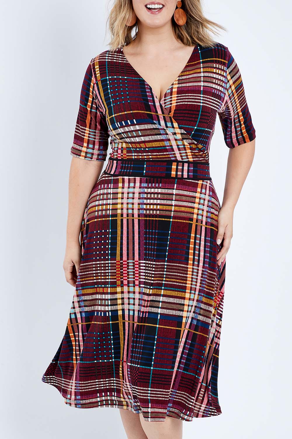Model Jess wearing size 14 of the Printed Short Sleeve Faux Wrap Dress in colour Checked (Black), from the front, cropped image