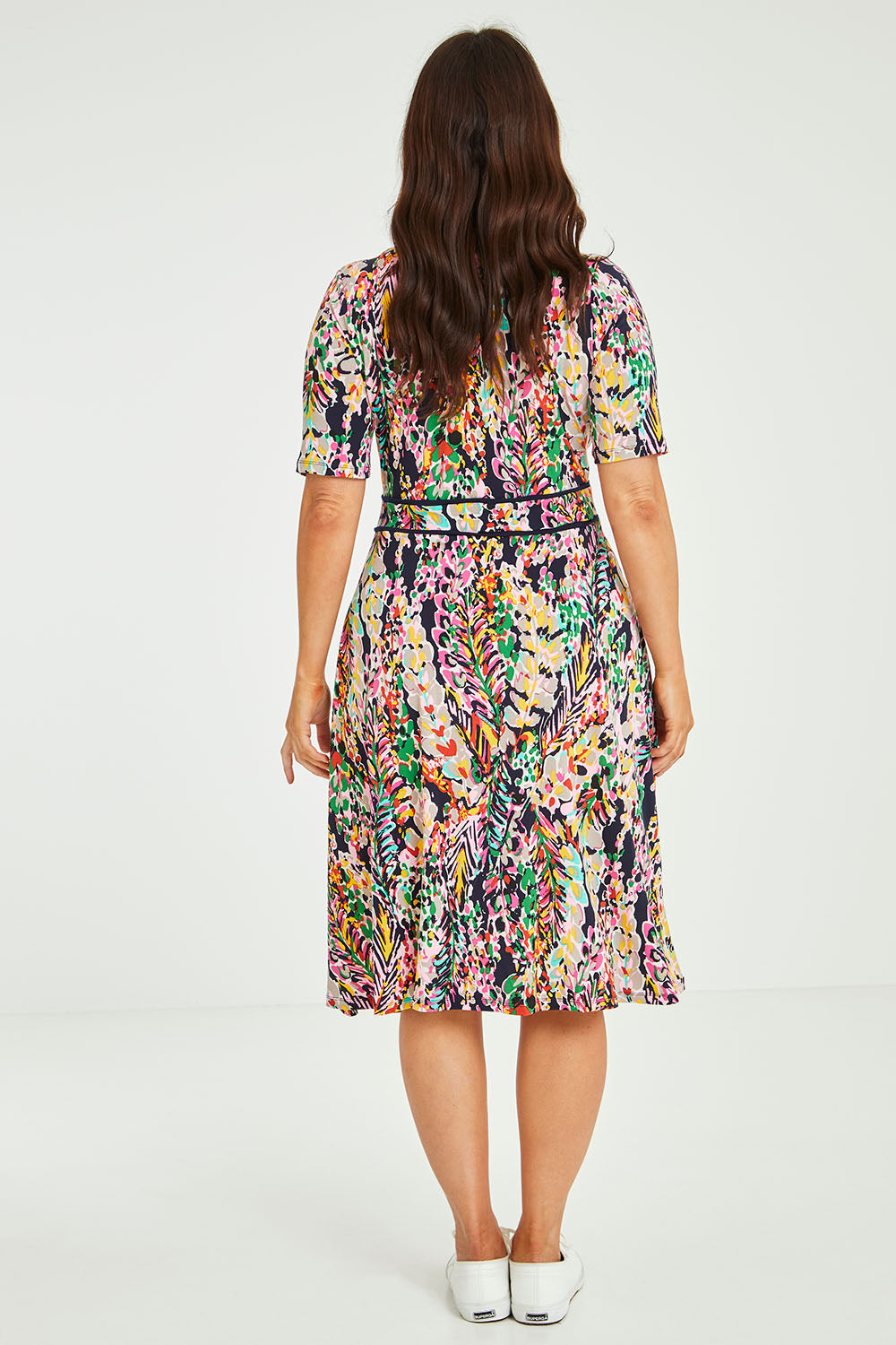 Model Laura wearing size 14 of the Printed Short Sleeve Faux Wrap Dress in colour Colourful (Blue), from the back