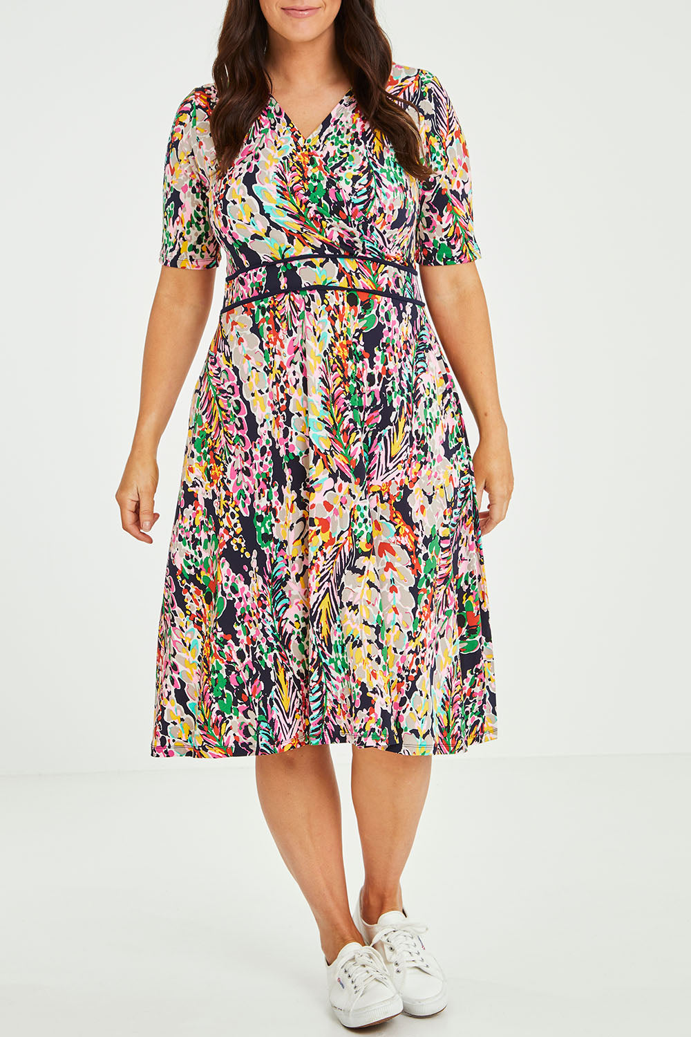 Model Laura wearing size 14 of the Printed Short Sleeve Faux Wrap Dress in colour Colourful (Blue), from the front, cropped image