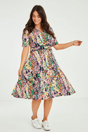 Model Laura wearing size 14 of the Printed Short Sleeve Faux Wrap Dress in colour Colourful (Blue), from the front, showing the whole outfit