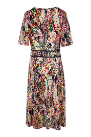 Product shot of the Printed Short Sleeve Faux Wrap Dress in colour Colourful (Blue), from the back