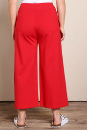 Model Georgiel wearing size 10 of the Wide Leg Ponte Pant – Brightred in colour Brightred, from the back