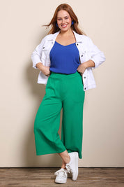 Model Georgiel wearing size 10 of the Wide Leg Ponte Pant – Green in colour Green, from the front
