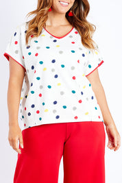 Model Laura wearing size 14 of the Multi Spot Tee in colour Multispot (White), from the front, cropped image