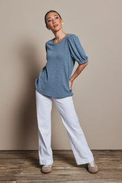 Model Katie wearing size 10 of the Gathered Sleeve Top in colour Denim (Blue), from the front, showing the whole outfit