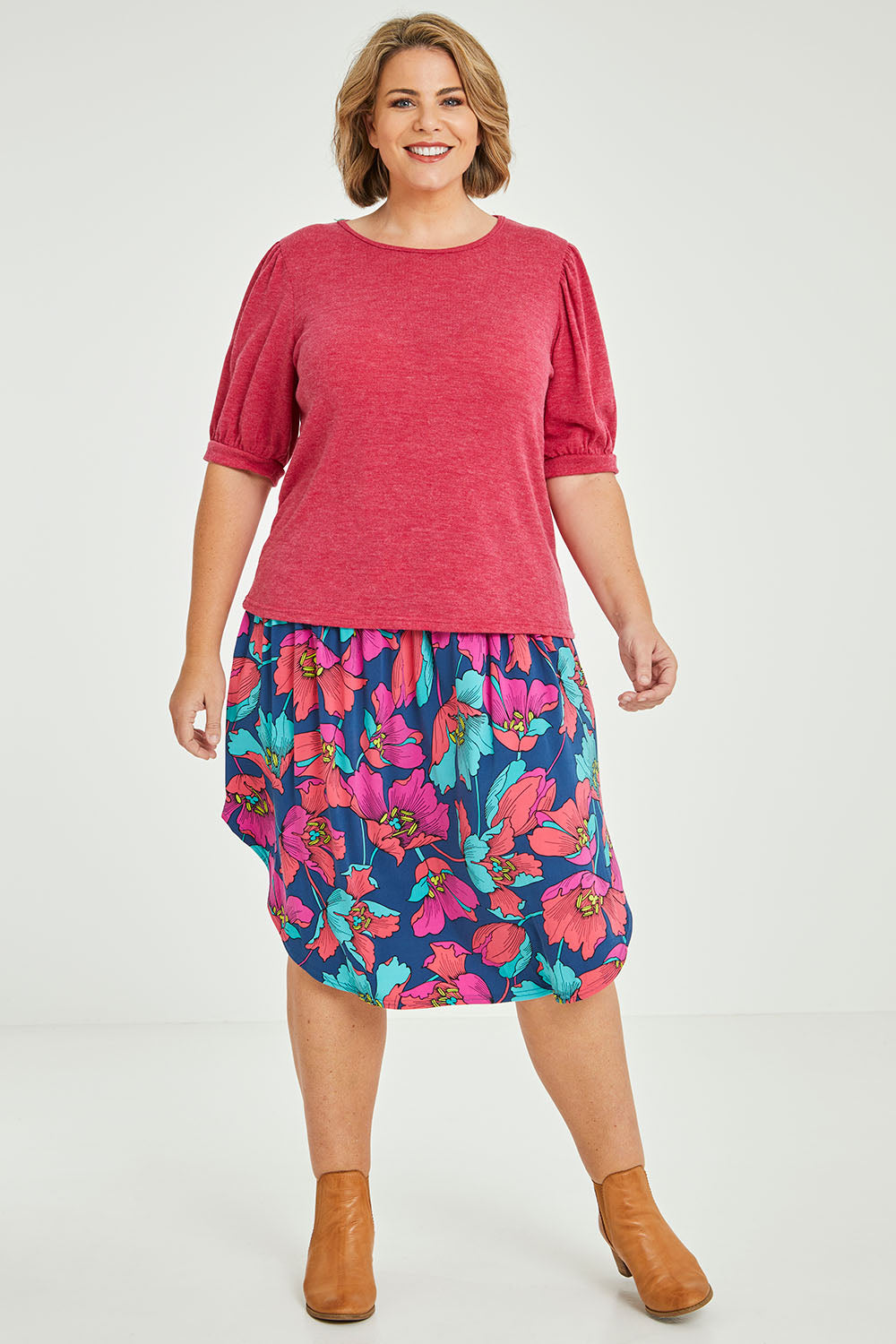 Model Fiona wearing size 16 of the Gathered Sleeve Top in colour Hotpink (Pink), from the front, showing the whole outfit