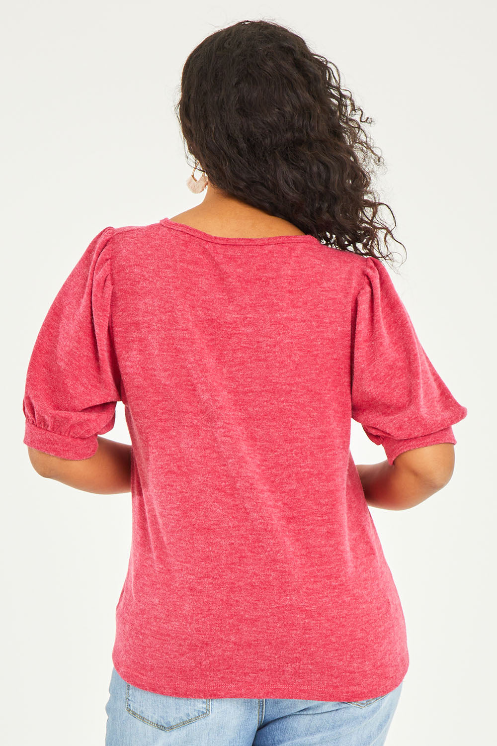 Model Terri-Leigh wearing size 14 of the Gathered Sleeve Top in colour Hotpink (Pink), from the back