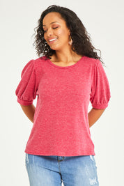 Model Terri-Leigh wearing size 14 of the Gathered Sleeve Top in colour Hotpink (Pink), from the front, cropped image
