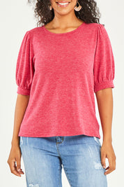 Model Terri-Leigh wearing size 14 of the Gathered Sleeve Top in colour Hotpink (Pink), from the front, cropped image
