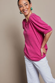 Model Katie wearing size 10 of the Gathered Sleeve Top in colour Magenta (Pink), from the front, cropped image