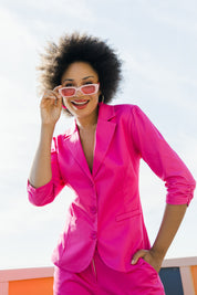 Model Olivia wearing size 10 of the Buttoned Blazer in colour Hotpink (Pink), from the front, showing the whole outfit