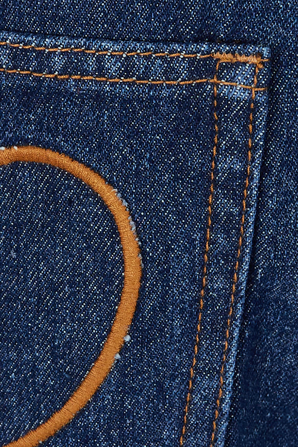 Product shot of the Patch Denim High Waist Jeans in colour Heart (Blue), detail