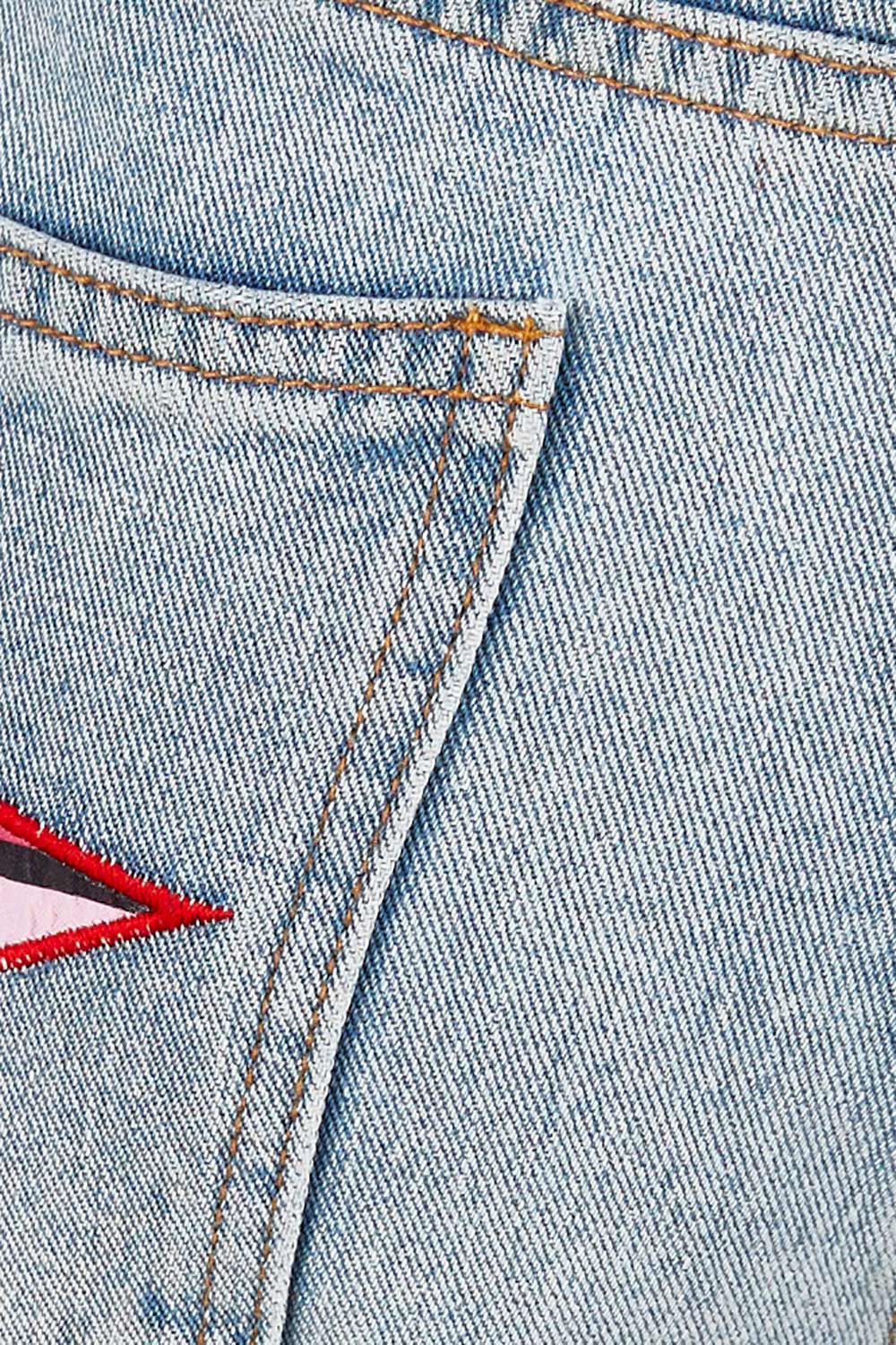Product shot of the Patch Denim High Waisted Jeans in colour Denim (Blue), detail
