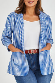 Model Monique wearing size 14 of the Long Line Blazer in colour Bluecheck (Blue), from the front, cropped image