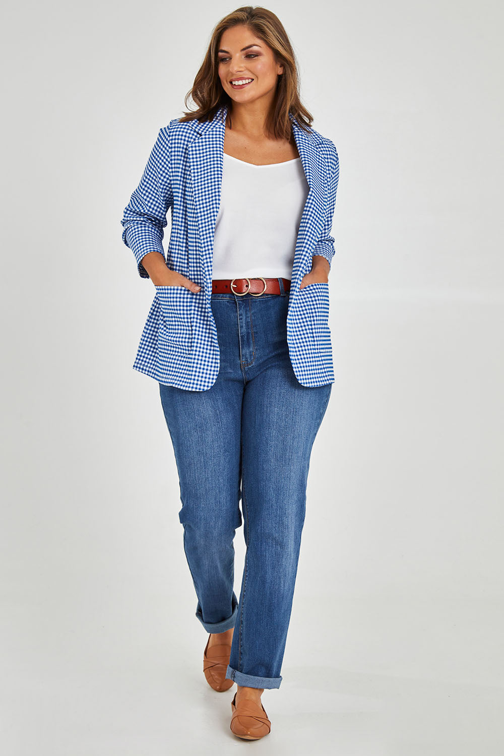 Model Monique wearing size 14 of the Long Line Blazer in colour Bluecheck (Blue), from the front, showing the whole outfit