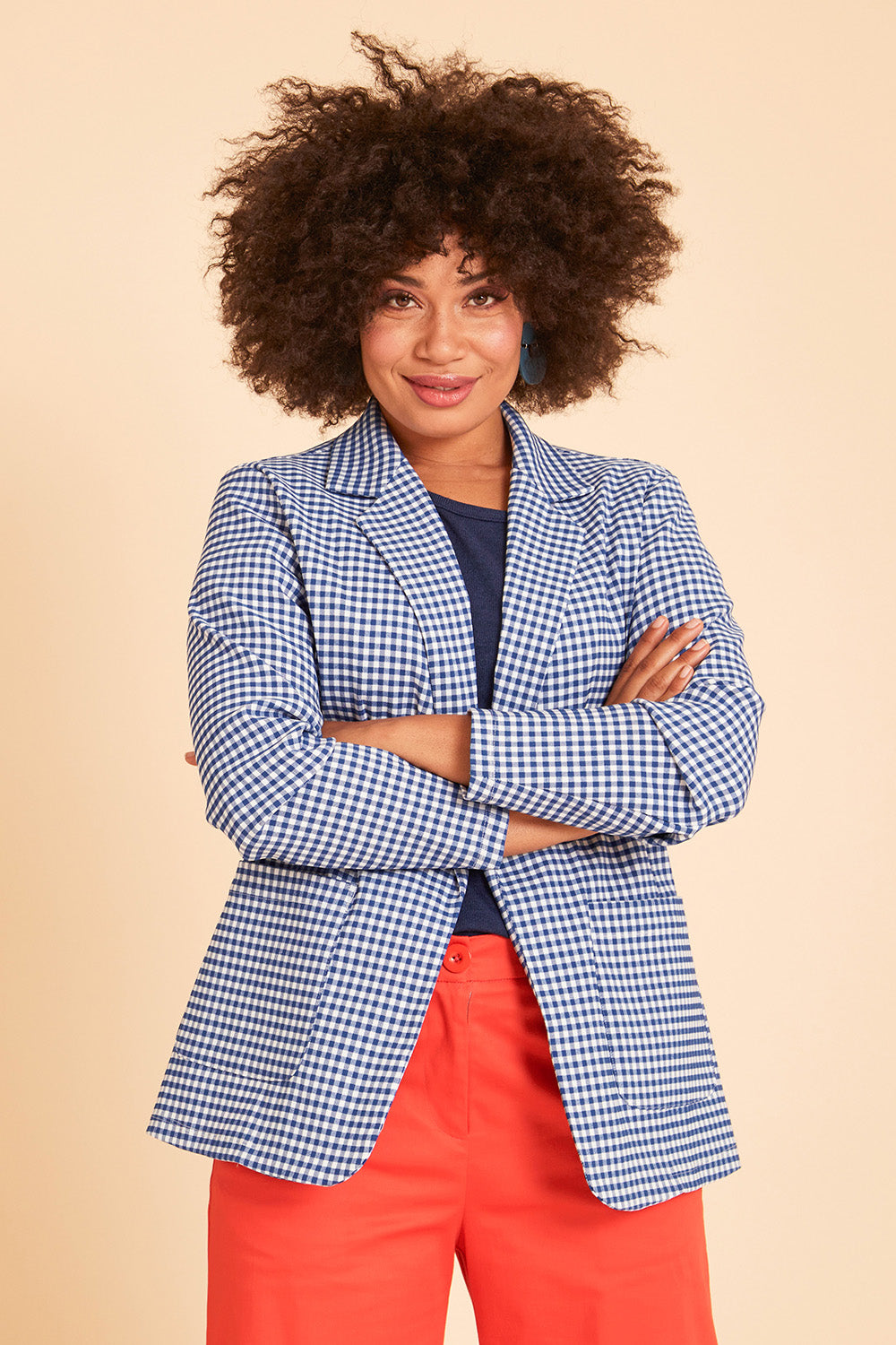 Model Olivia wearing size 10 of the Long Line Blazer in colour Bluecheck (Blue), from the front, showing the whole outfit