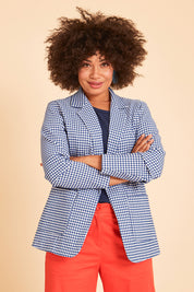 Model Olivia wearing size 10 of the Long Line Blazer in colour Bluecheck (Blue), from the front, showing the whole outfit