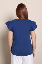 Model Georgiel wearing size 10 of the Ruffle Sleeve Top – Navy in colour Navy, from the back