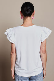 Model Katie wearing size 10 of the Ruffle Sleeve Top in colour White (White), from the back