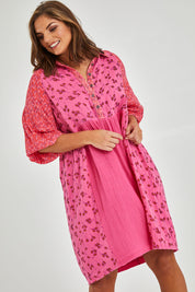 Model Monique wearing size 14 of the Bubble Sleeve Half Placket Dress in colour Mixedpink (Pink), from the front, cropped image