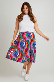 Model Laura wearing size 14 of the Elastic Waist Skirt in colour Graphic (Purple), from the front, showing the whole outfit