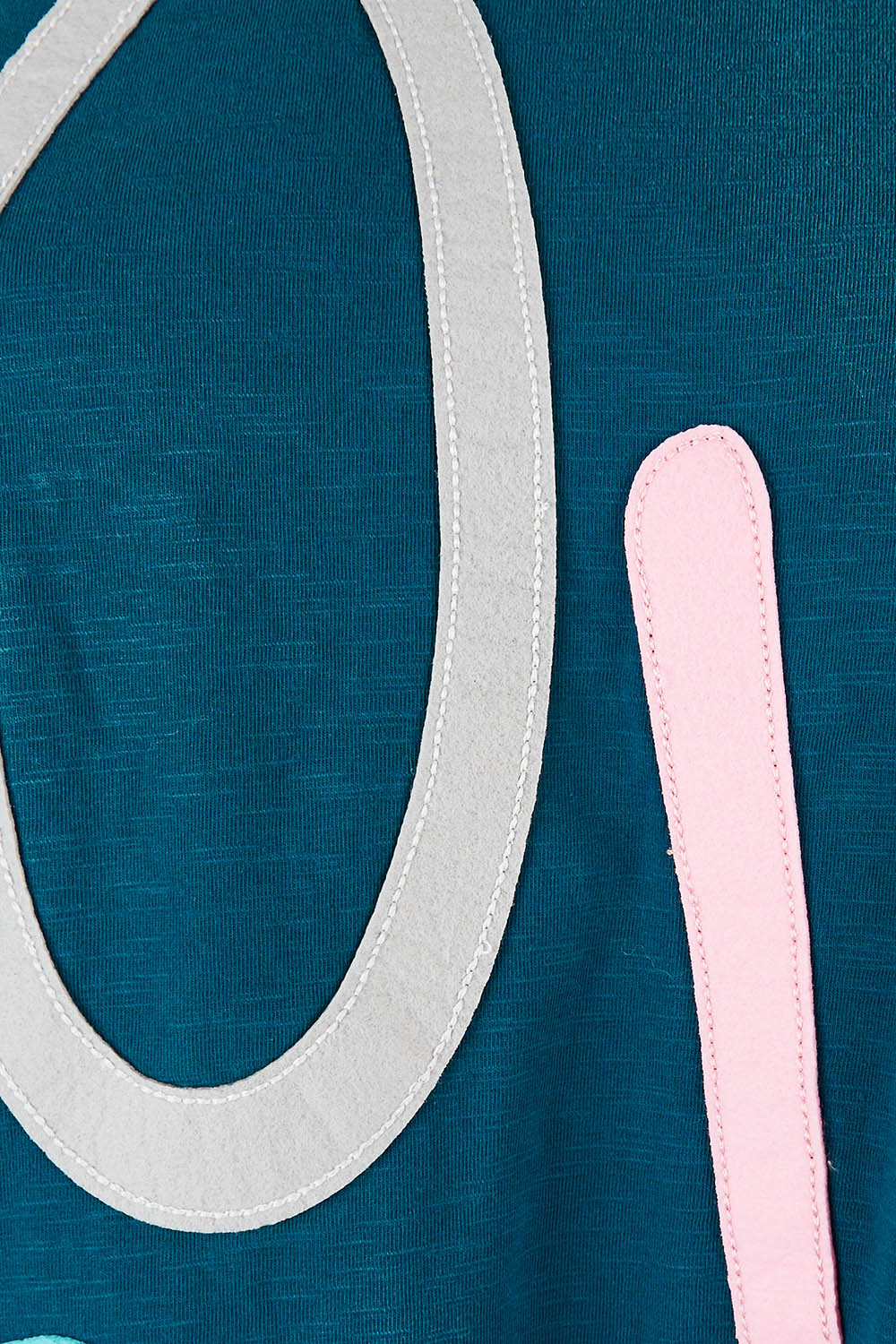 Product shot of the Love Long Sleeve Tee in colour Love (Blue), detail