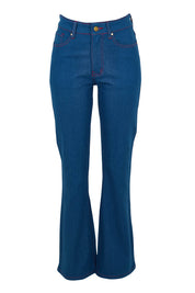 Product shot of the Bell Bottom Jeans in colour Middenim (Blue), from the front