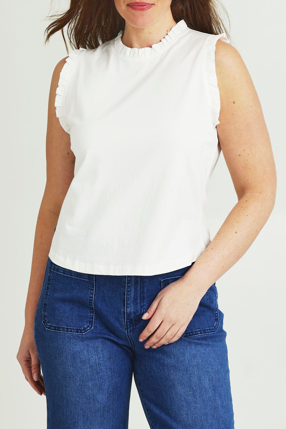 Model Jane wearing size 14 of the Cotton Frill Tank in colour White (White), from the front, cropped image