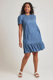 Model Terri-Leigh wearing size 14 of the Frill Hem Dress in colour Blue (Blue), from the front, showing the whole outfit