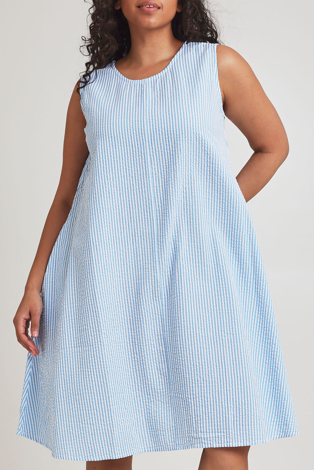 Model Terri-Leigh wearing size 14 of the Summer Stripe Cotton Tank Dress in colour Bluestripe (Blue), from the front, cropped image