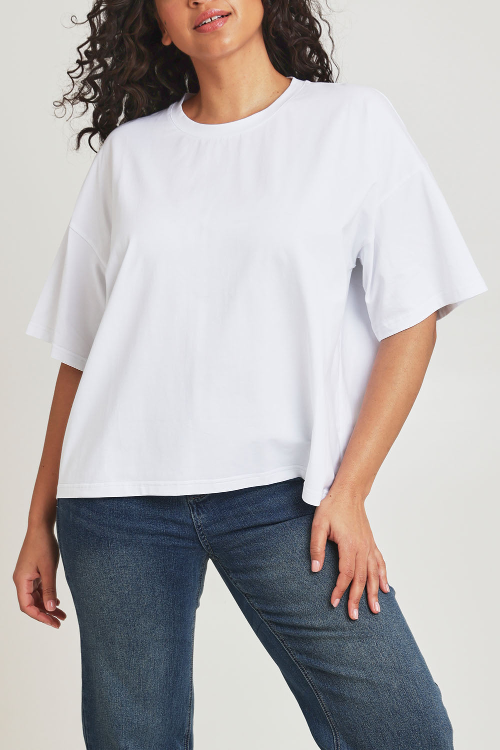 Model Terri-Leigh wearing size 14 of the Mercerised Cotton Printed Tee in colour Flower (White), from the front, cropped image