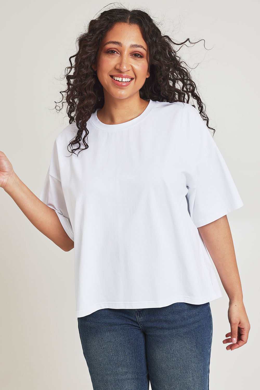 Model Terri-Leigh wearing size 14 of the Mercerised Cotton Printed Tee in colour Flower (White), from the front, cropped image