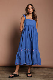 Model Madeline wearing size 10 of the Cotton Embroidered Midi Dress in colour Blue (Blue), from the front, showing the whole outfit