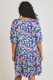 Model Terri-Leigh wearing size 14 of the Flared Hem Dress in colour Floral, from the back