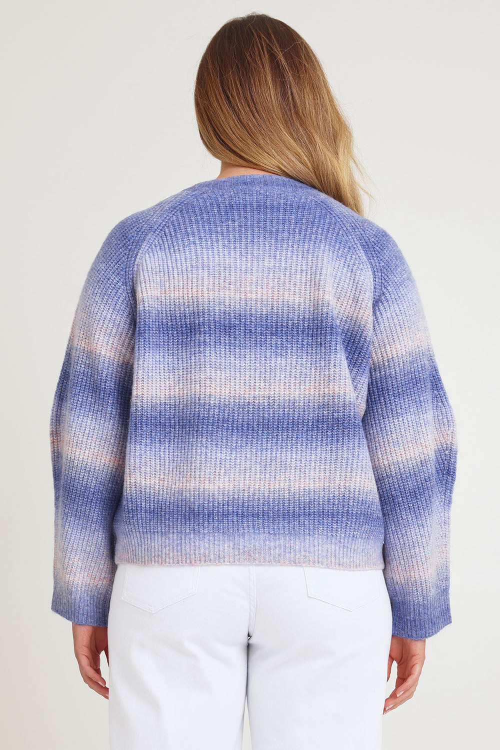 Model Chanel wearing size XL of the Space Dyed Yarn Crewneck Sweater in colour Dusk (Blue), from the back