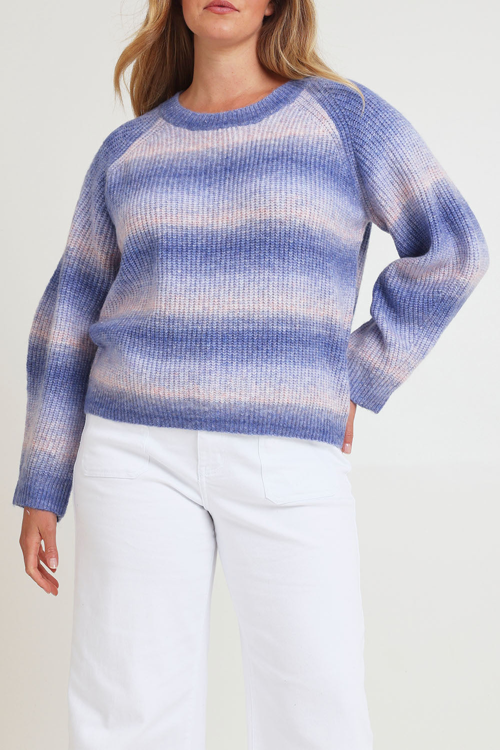Model Chanel wearing size XL of the Space Dyed Yarn Crewneck Sweater in colour Dusk (Blue), from the front, cropped image