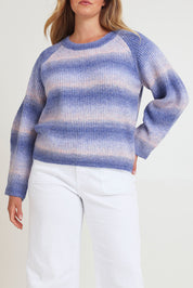 Model Chanel wearing size XL of the Space Dyed Yarn Crewneck Sweater in colour Dusk (Blue), from the front, cropped image