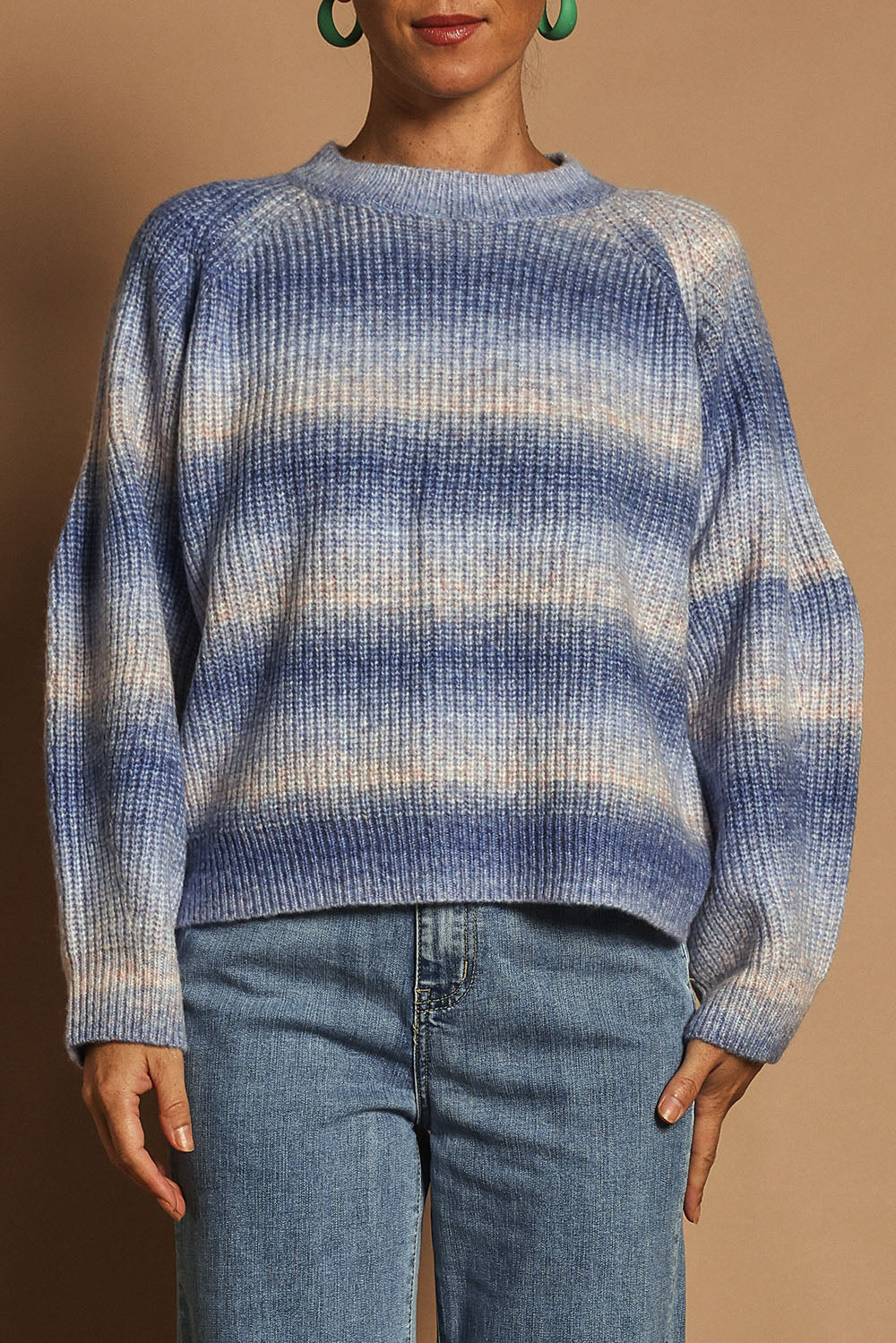 Model Katie wearing size S of the Space Dyed Yarn Crewneck Sweater in colour Dusk (Blue), from the front, cropped image