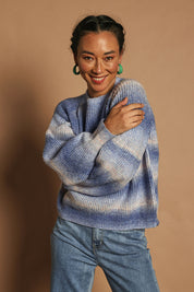 Model Katie wearing size S of the Space Dyed Yarn Crewneck Sweater in colour Dusk (Blue), from the front, cropped image