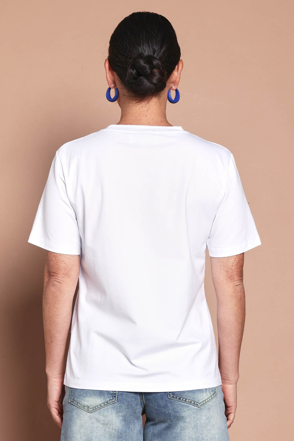 Model Katie wearing size 10 of the Mercerized Cotton Love Tee in colour Boldblue (Blue), from the back