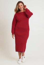 Model Chanel wearing size XL of the Cotton Stripe Knit Dress in colour Redpurple (Red), from the front, showing the whole outfit