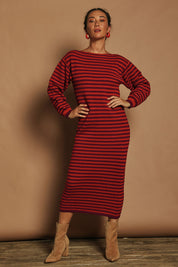 Model Katie wearing size S of the Cotton Stripe Knit Dress in colour Redpurple (Red), from the front, showing the whole outfit